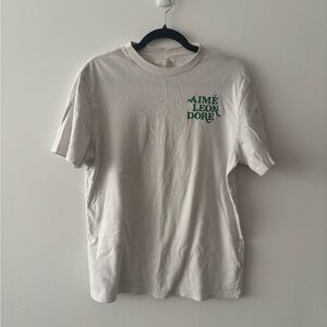 Aime Leon Dore Cream Tee with Green Logo